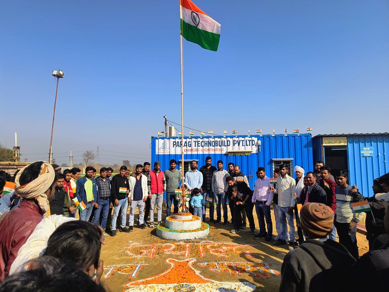 Workers celebrating Independence Day at Parag Technobuild site